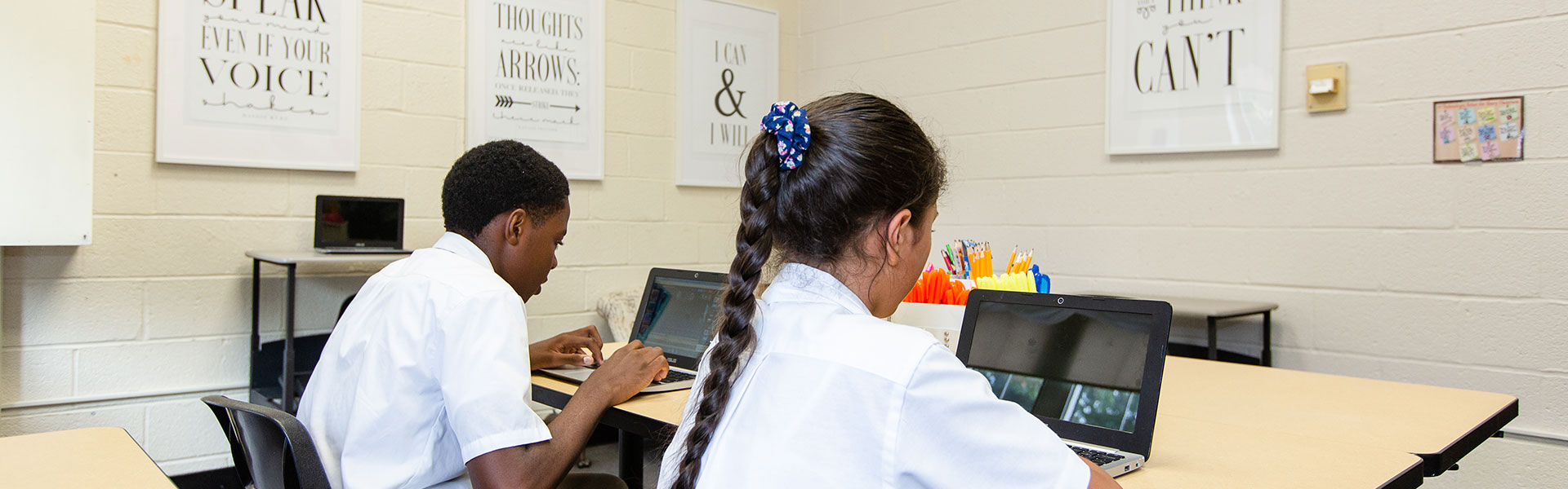 kids working on computers as part of stream initiative at annunciation catholic school dc